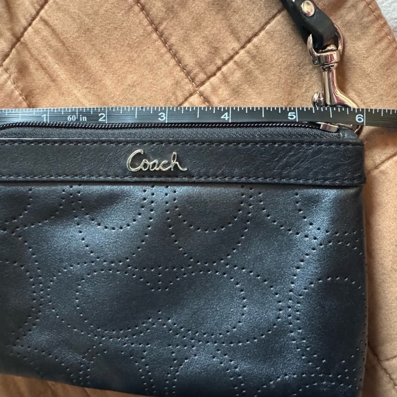 Sophisticated Coach Black Perforated Wristlet - Picture 10 of 13